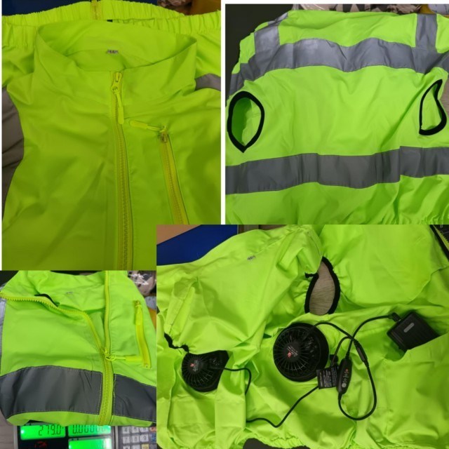 Groen veiligheidsvest met koelventilator Hi Vis Reflecterend vest en ventilatoren voor veiligheidswerkers op de weg